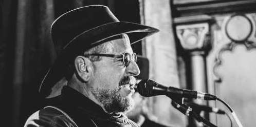 Cowboy Poetry man at mic -- pexels-photo-2114760-by-Kevin-Bidwell