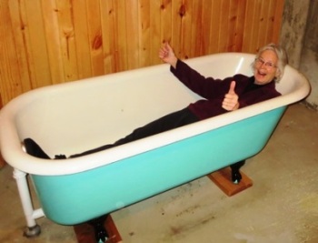 Linda testing the new cast iron clawfoot tub 2017